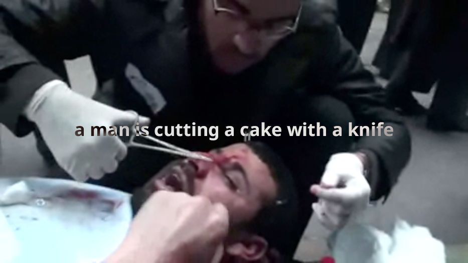 A man cutting a cake with a knife